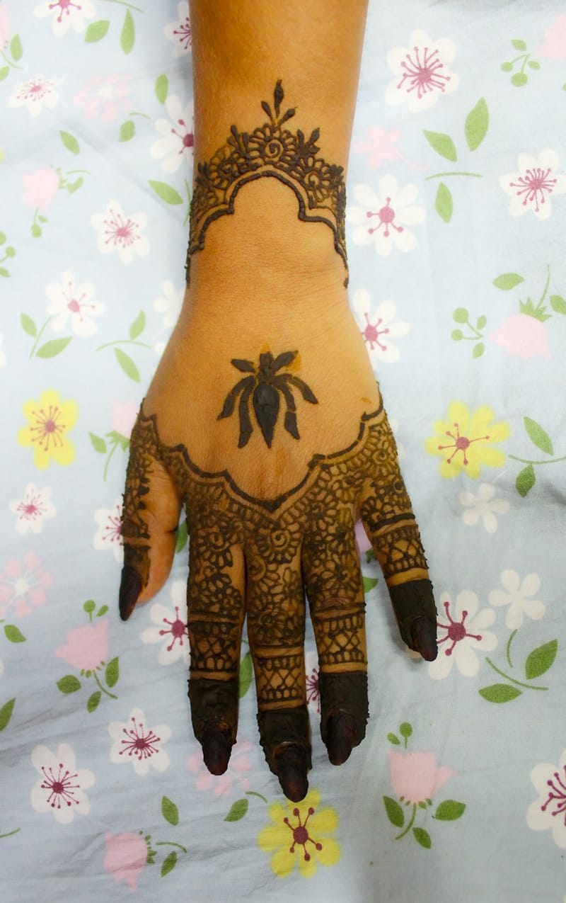 Sacred lotus traditional wrist band mehndi complementary to bridal chooda
